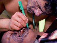 Zac tattooed