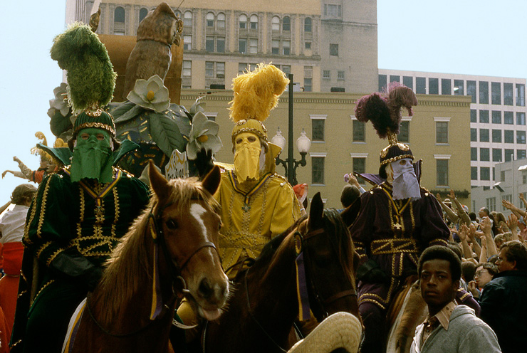 Black masked men on horses